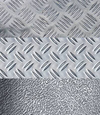 Aluminiumpl&aring;t av typen havrekorn, five-bar och stucco.